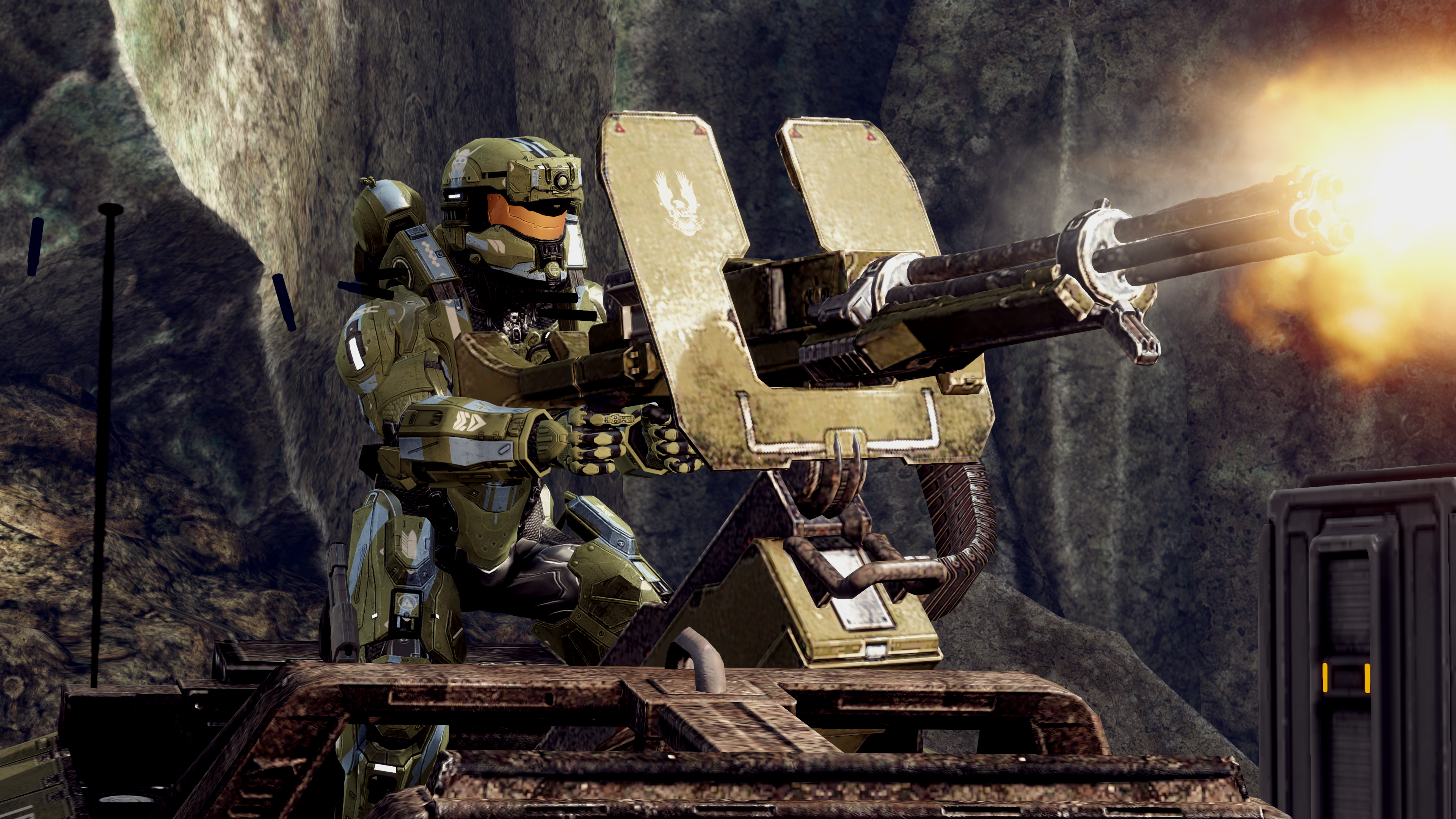 An Enforcer-clad Spartan-IV on an M46 Vulcan at Two Giants in Requiem.