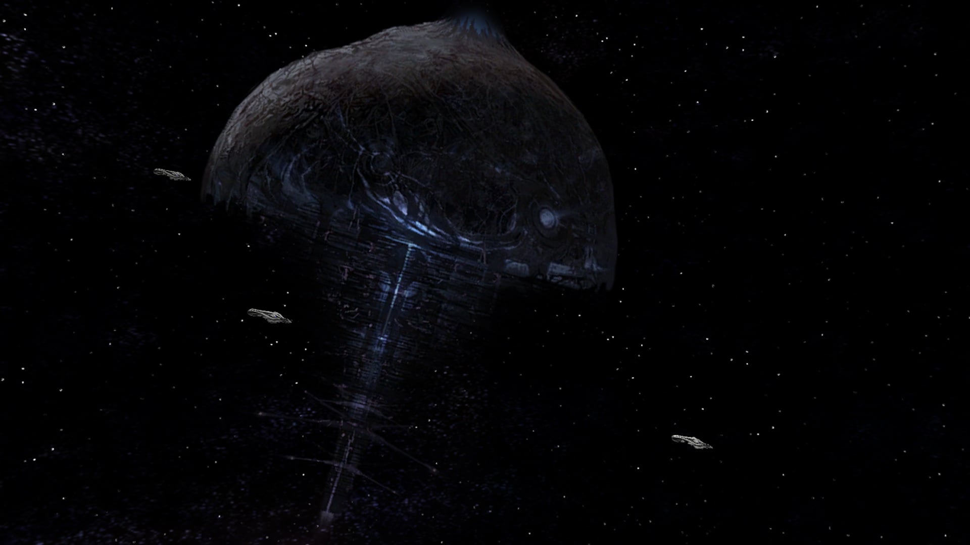 A screenshot of High Charity and a small number of Syfon-pattern assault carriers of the Second Fleet of Homogenous Clarity. This is one of a number of environments that were intended to update depending on the player's progress through the campaign.