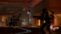 A Jiralhanae Chieftain charges at an ODST.