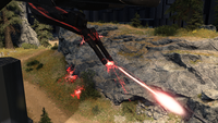 Effects emitting from the Eklon'Dal Workshop Phantom's heavy plasma cannon while it fires in Halo Infinite.