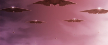 A wing of five Longswords seen dropping bombs on a city, in Halo Legends: Origins II.