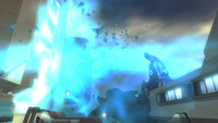 The Covenant artillery fires at a building.
