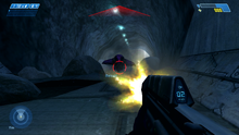 A Ghost approaches the Master Chief in Halo: Combat Evolved.
