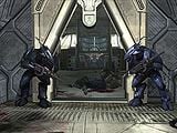 A pair of Sangheili Minors securing the doorway leading into the interior of a barrier tower.