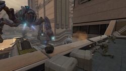 A Protos-pattern Scarab approaches the UNSC command post in Halo 2: Anniversary campaign level Metropolis.