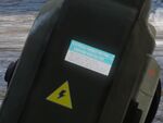 A 'high voltage' warning sticker placed on the back of the Spartan Laser.