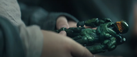 A human child holding a Spartan-IV action figure painted to resemble the Master Chief in A Hero Falls.