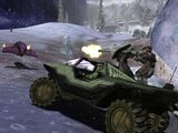 The Master Chief driving a Warthog.