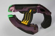The plasma pistol prop built by WETA Workshop for Halo: Landfall.
