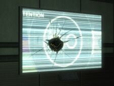 Veronica Dare's damaged Recon helmet lodged into a screen inside a building in New Mombasa Sector 5, as seen in Halo 3: ODST campaign level Mombasa Streets.