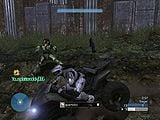 A Mark VI Spartan splatters a Spartan in a Mongoose in Halo 3.
