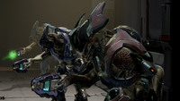 Three Sangheili armed with plasma pistols during an assault on the UNSC Infinity.