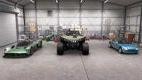 An M12S (center) being used as a display car in a garage alongside an Aston Martin Valkyrie (left) and a Honda Beat (right).