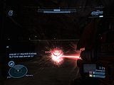A first-person view of the Spartan Laser's targeting reticule firing at short-range in the Halo: Reach Beta.