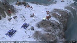 A screenshot of an early build of Halo Wars, depicting a UNSC army fighting the Covenant on Chasms.