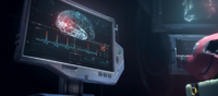 A computer screen displaying Dinh's vitals and brain activity.