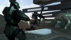 John-117 firing at Jiralhanae Chieftain Cethegus during the Battle of Installation 00. From Halo 3 campaign level The Ark.