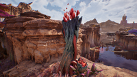 Another alien flora, emitting red bubbles that dissolve into the air.