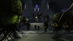 A swarm of pod infectors approach John-117 in a Flood containment facility on Installation 04.