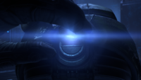 John-117 inserting a crystal chip into his GEN3 Mark VI MJOLNIR armor in Halo Infinite.