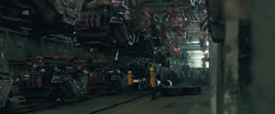 Screenshot from "A Hero Falls". A M12B Warthog assembly line.