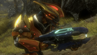 A Sangheili Officer wielding the plasma repeater.