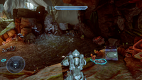 Third-person view of Frederic-104 using an attached plasma cannon in the Halo 5: Guardians campaign.