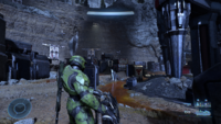 John-117 using a Scrap Cannon in Halo Infinite.