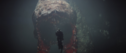 The Gravemind with a captured John-117.