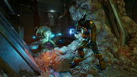 A Sangheili Zealot using a plasma rifle in combat against the Flood.