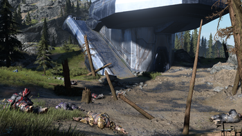 Dead Jiralhanae near a beacon tower on Installation 07 in Halo Infinite campaign.