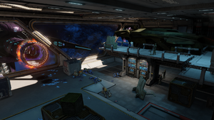 A group of Marines stand victorious after successfully defending Cairo Station's Hangar A-01 from the Covenant during the Battle of Earth. Dead Sangheili and Unggoy litter the room, and the R'sisho-pattern Tick boarding craft that the Covenant used to enter can be seen docked to the hangar bay.