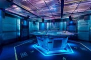 The holotank at the center of the simulation briefing room.