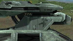 A closeup screenshot of an M808C Scorpion's M512 smooth-bore high-velocity cannon on Forge World, showcasing the S-052 tag and Scorpion emblem.