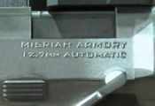 An M6G handgun stamped with Misriah Armory's logo.