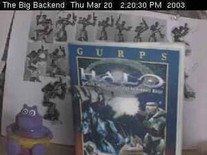 A photo from the Bungie Webcam showing the cover of GURPS Halo.
