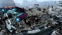A Spirit dropship hovers over a battlefield in Halo Wars.