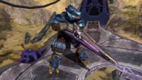 A Jiralhanae with a particle beam rifle on a watchtower in Halo 3.