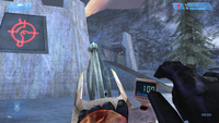 The Spartan taps the fuel tank indicator during the idle animation for the flamethrower in Halo: Combat Evolved.