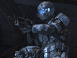 A Spartan-IV wearing the Talon helmet with a CNM(5)/BNR/FASCINATOR module attached to it on the map Cliffhanger in an interior.