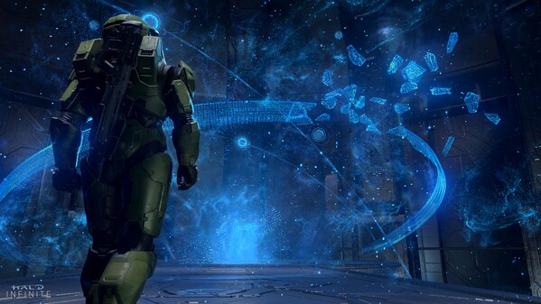 Master Chief inspecting a Forerunner hologram.
