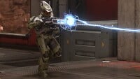 A Spartan firing the Purging Shock Rifle in multiplayer.