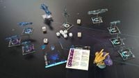Broadsword token and other tokens, miniatures, and dice in Halo: Fleet Battles.