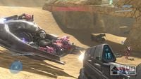 A red and a pink Sangheili on a Prowler on Sandtrap.