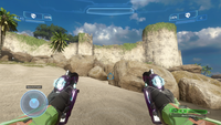 First-person view of dual-wielding plasma pistols in Halo 2: Anniversary multiplayer.