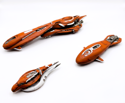A photo of three prototype/cancelled models from Halo: Fleet Battles, including early models for the Varric-pattern heavy cruiser, Rothen-pattern fireship, and a miscellaneous corvette.