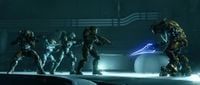 The Spartans land in front of the Sangheili Commander.