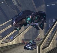 A Covenant Ru'swum-pattern Phantom deploying a Wraith during the Battle of Installation 00.