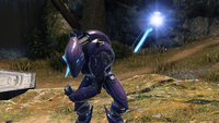 A Banished Special Operations Sangheili throws a plasma grenade.