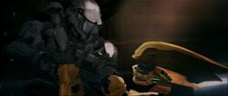 Screenshot of Jai-006 and Thel 'Vadamee battling in Halo 2: Anniversary terminals.